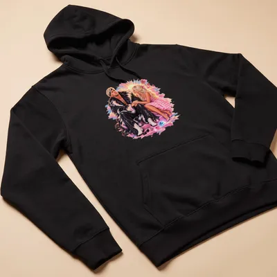 Vibrant retro print of a stylish couple with text "A Liberated Man" — printed on a unisex hoodie