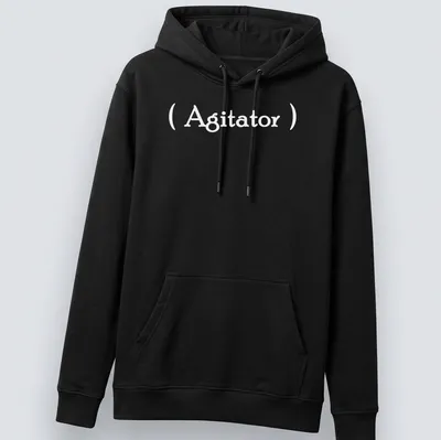 Minimalist Agitator t-shirt with bold white lettering on a simple background — printed on a unisex hoodie
