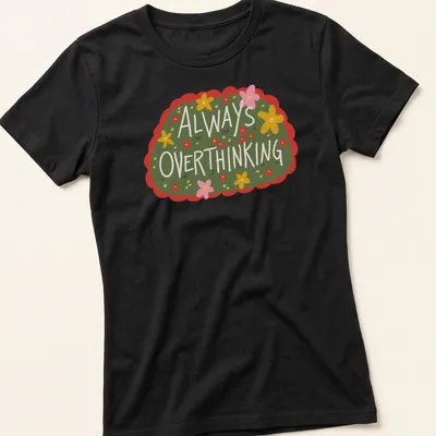Whimsical floral design with the text 'Always OVERTHINKING' in vibrant colors on green. — printed on a women's shirt