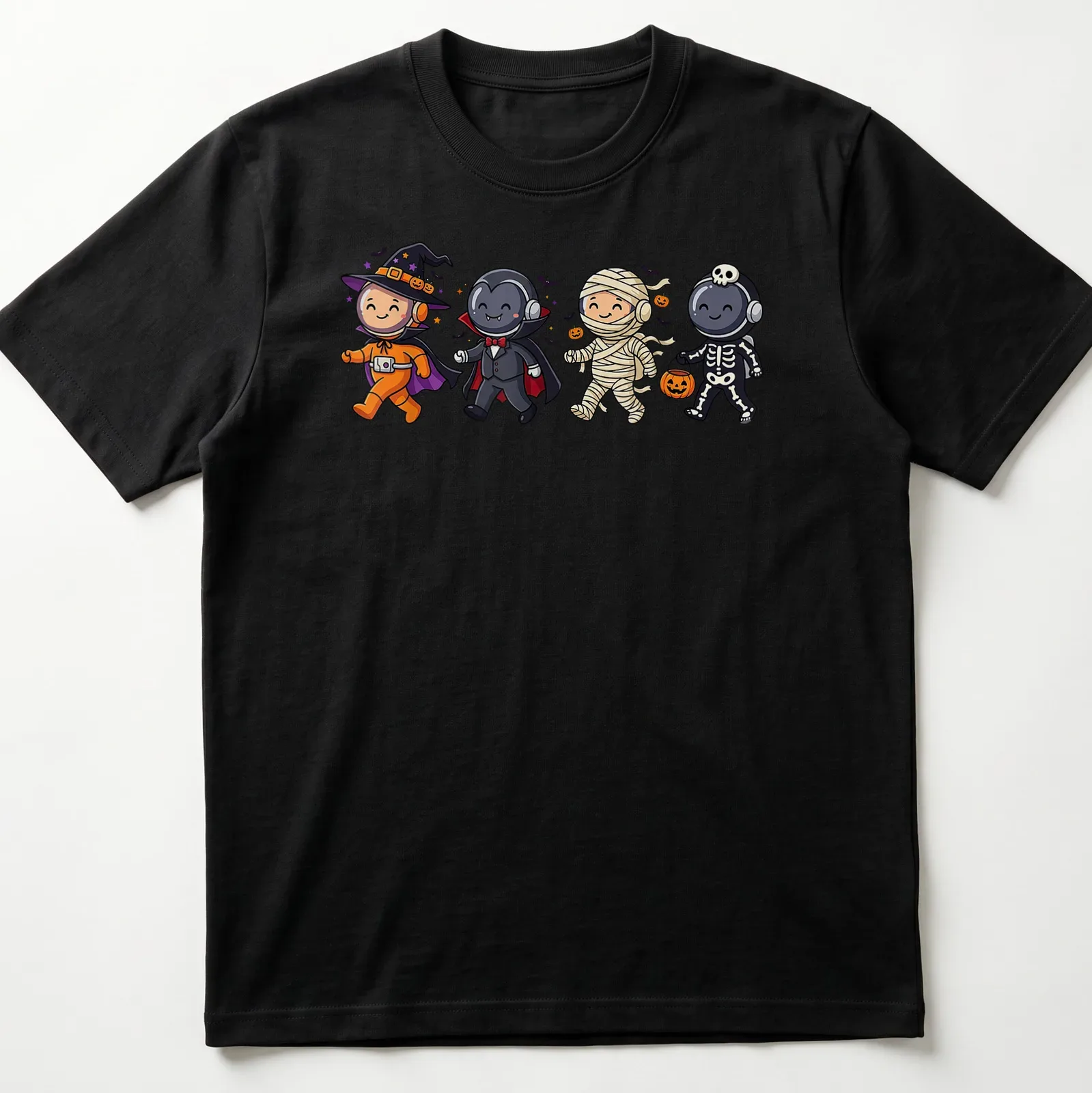 Kawaii astronauts in Halloween costumes with orange, purple, and black hues. — printed on a unisex t-shirt