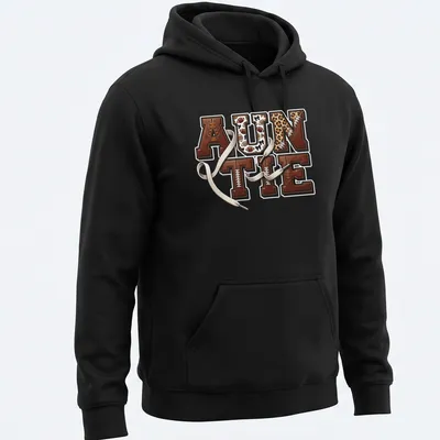 Retro sports design with 'AUNTIE' and football elements in warm colors. — printed on a unisex hoodie
