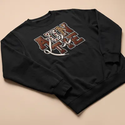 Retro sports design with 'AUNTIE' and football elements in warm colors. — printed on a unisex sweatshirt