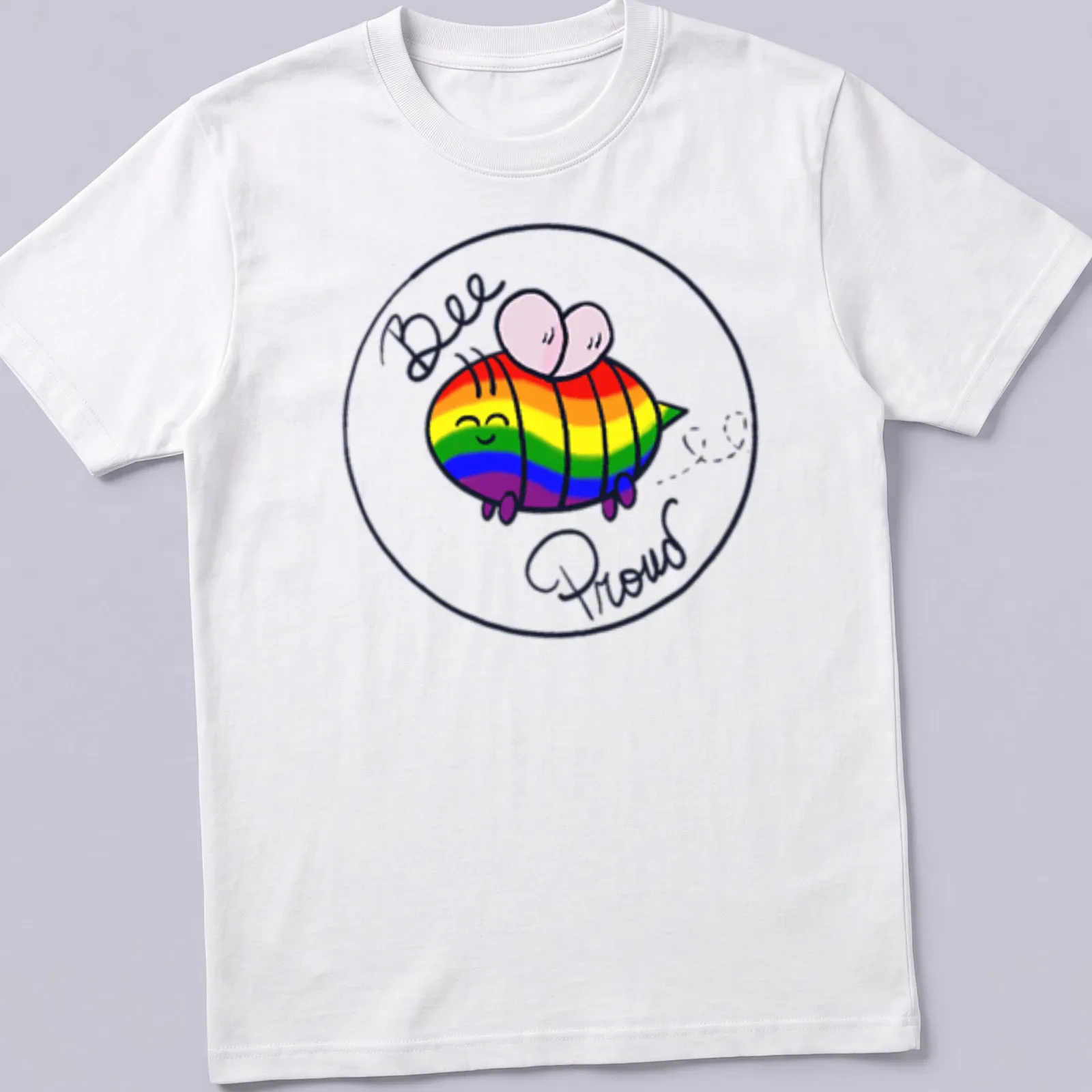 Kawaii rainbow bee design with the text Bee Proud in bright colors — printed on a unisex t-shirt