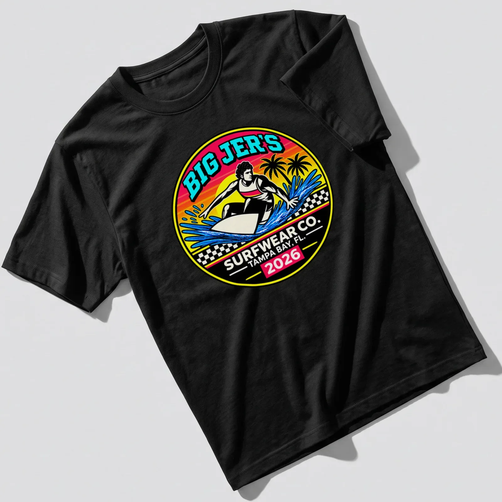 Vibrant retro print of a surfer riding a wave with text Big Jer's Surfwear Co. — printed on a unisex t-shirt