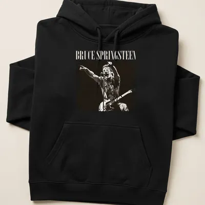 Vintage distressed t-shirt featuring Bruce Springsteen in black and cream typography — printed on a unisex hoodie