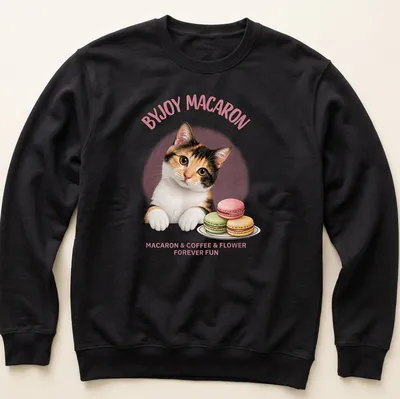 Cute calico cat surrounded by macarons and flowers with playful text — printed on a unisex sweatshirt