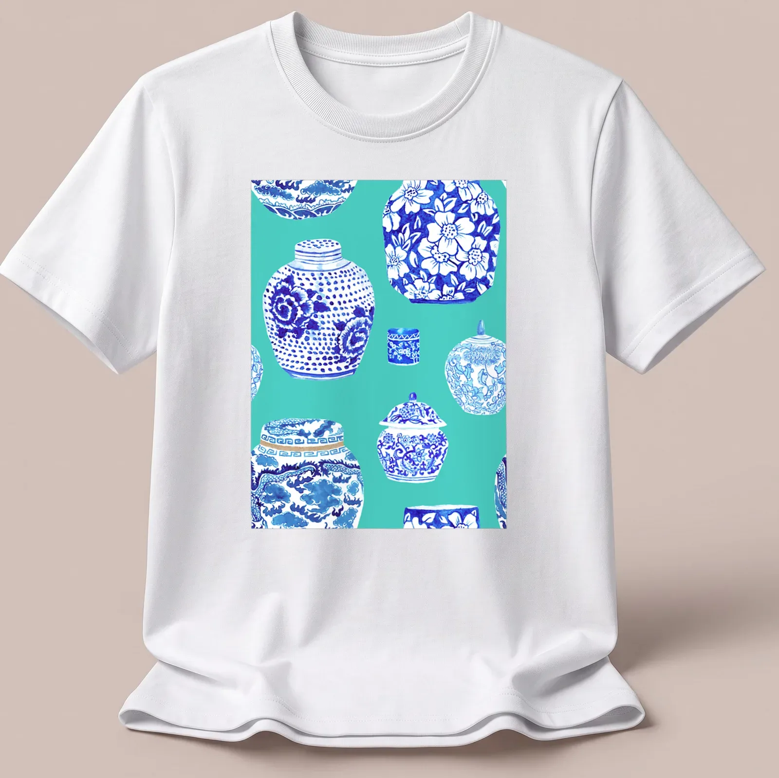Watercolor print of ginger jars in teal, blue, and white on a — printed on a unisex t-shirt