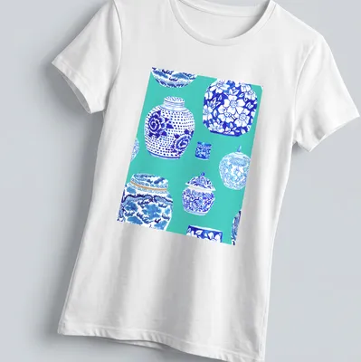 Watercolor print of ginger jars in teal, blue, and white on a — printed on a women's shirt