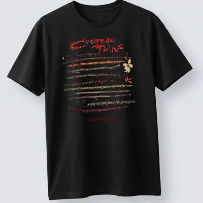 Vintage Cocteau Twins t-shirt featuring thorns around the text in earthy colors