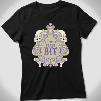 Ornate vintage skull graphic with 'COMMIT TO THE BIT' in bold lettering — printed on a women's shirt