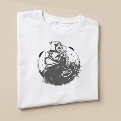 Vintage distressed T-shirt featuring a duck with sunglasses and a grenade — printed on a unisex t-shirt (angled view)