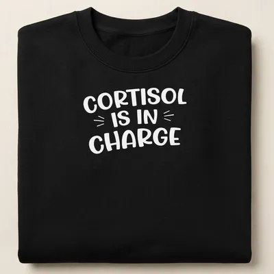 Funny cartoon print of the cortisol molecule with text about stress management — printed on a unisex sweatshirt