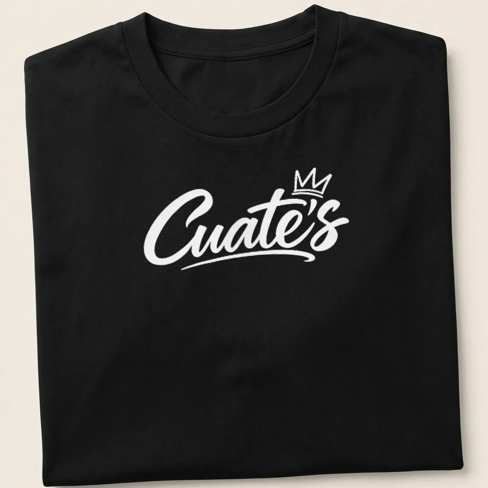 White script font reading 'Cuate's' on a barbershop themed — printed on a unisex t-shirt