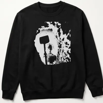 Distressed t-shirt featuring a doll holding a shovel in black, white, and gray — printed on a unisex sweatshirt
