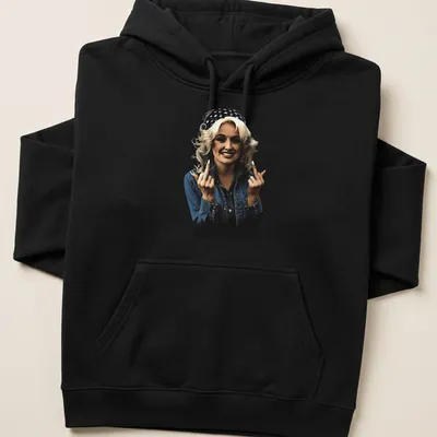 Vintage-style illustration of Dolly Parton giving the finger in black, blue, white, and beige — printed on a unisex hoodie