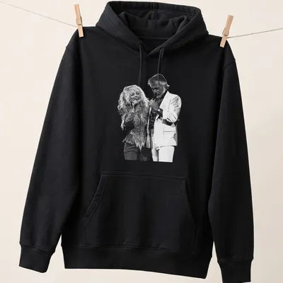 Vintage graphic of Dolly Parton performing with another artist in black and white — printed on a unisex hoodie