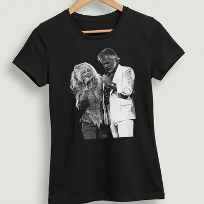 Vintage graphic of Dolly Parton performing with another artist in black and white — printed on a women's shirt