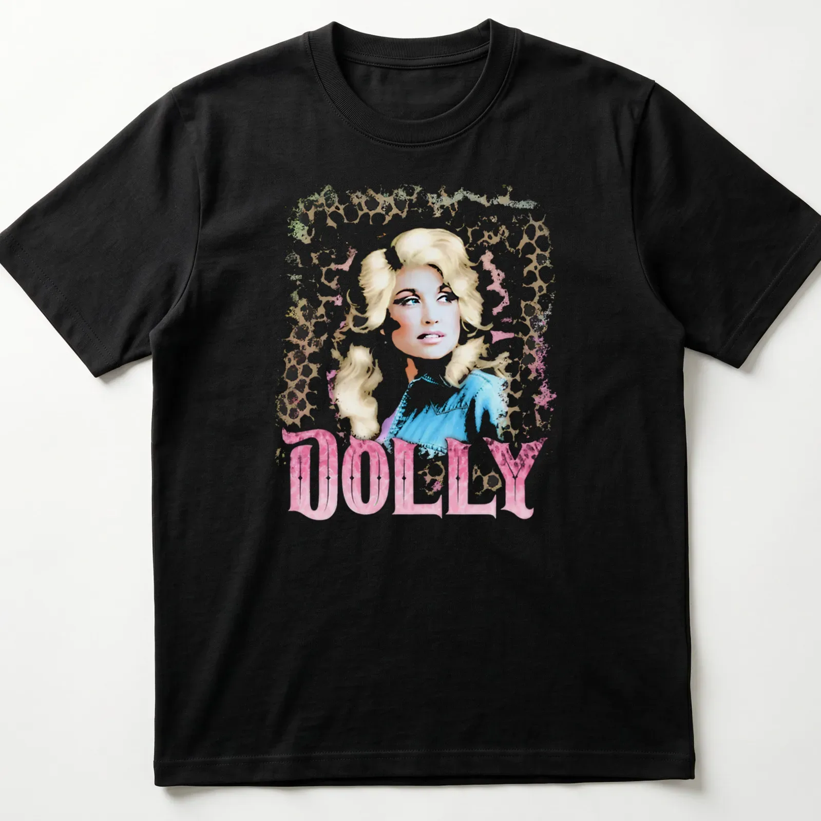 Dolly Parton vintage glam tee featuring leopard print design and bold lettering. — printed on a unisex t-shirt