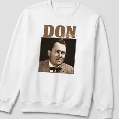 Vintage-style t-shirt featuring a portrait of Don Gibson in classic colors. — printed on a unisex sweatshirt