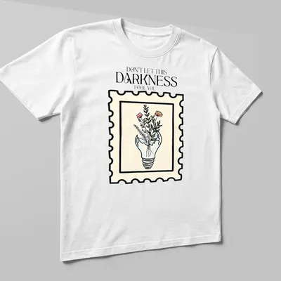 Illustrative design of a light bulb with flowers and text in pastel colors — printed on a unisex t-shirt (angled view)