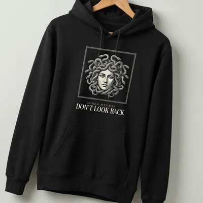 Detailed line art of Gorgo Medusa with snake hair in white and gold — printed on a unisex hoodie