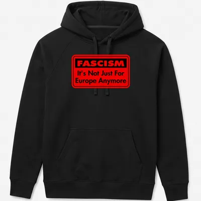 Bold typography shirt featuring text about fascism in red and black — printed on a unisex hoodie