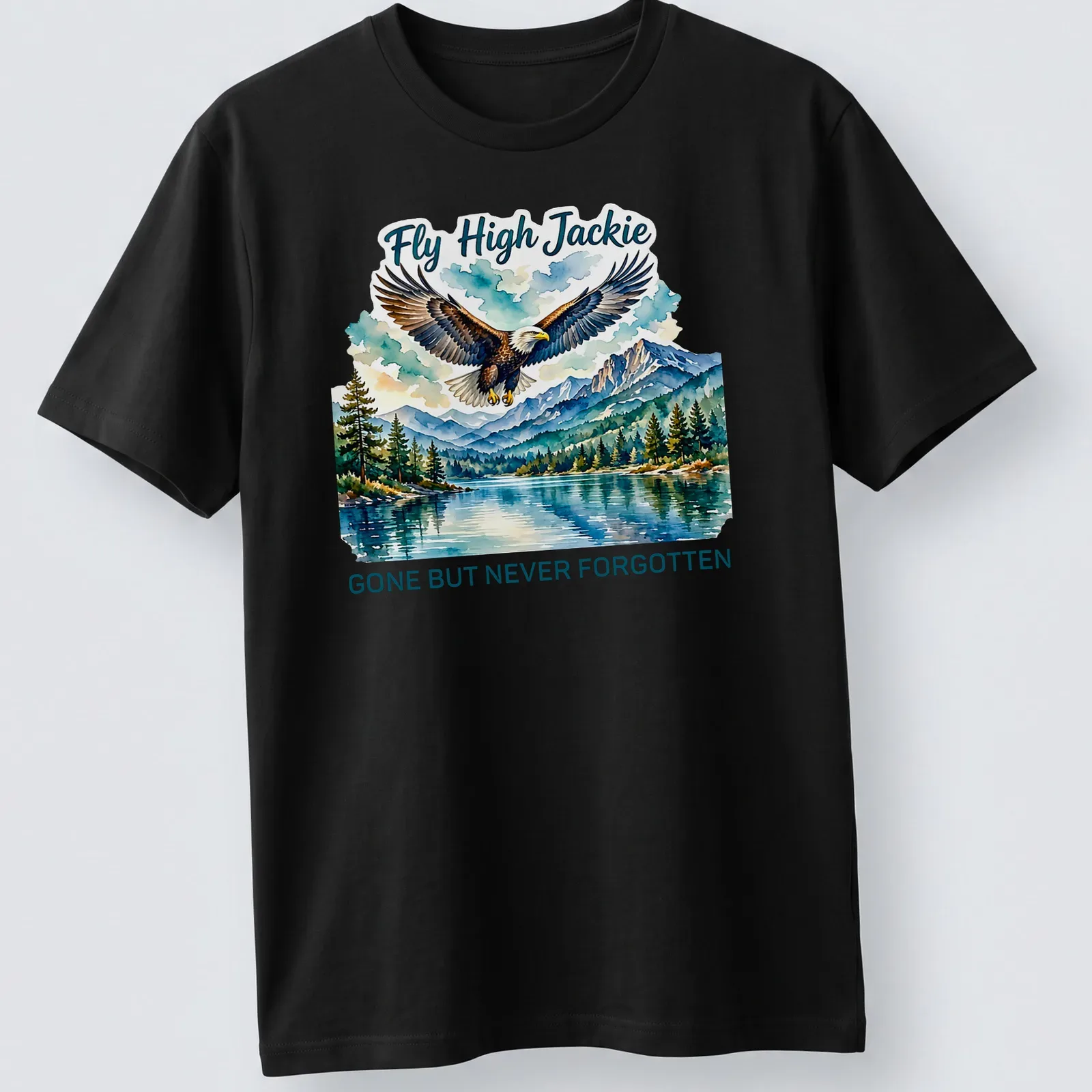 Watercolor print of a bald eagle with the text 'Fly High Jackie GONE BUT NEVER FORGOTTEN' — printed on a unisex t-shirt