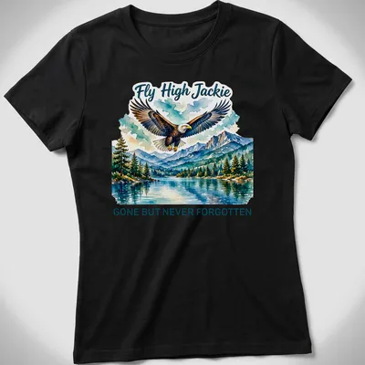 Watercolor print of a bald eagle with the text 'Fly High Jackie GONE BUT NEVER FORGOTTEN' — printed on a women's shirt