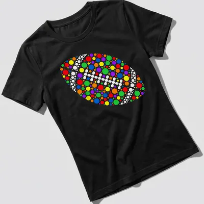 Colorful abstract football design composed of dots in various colors — printed on a women's shirt