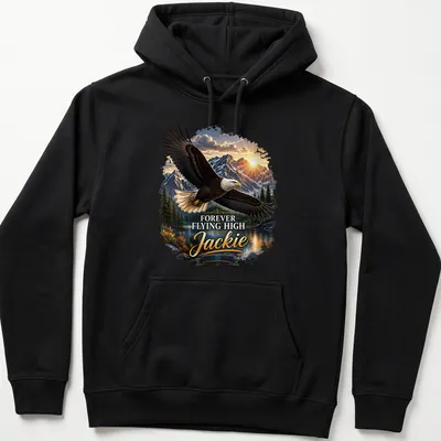 Realistic bald eagle in flight with text honoring Jackie 2012-2026 — printed on a unisex hoodie