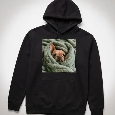 Realistic illustration of a French Bulldog wrapped in a soft blanket — printed on a unisex hoodie