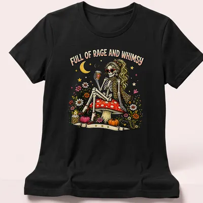 Whimsical skeleton on a mushroom with vibrant colors and text above. — printed on a women's shirt