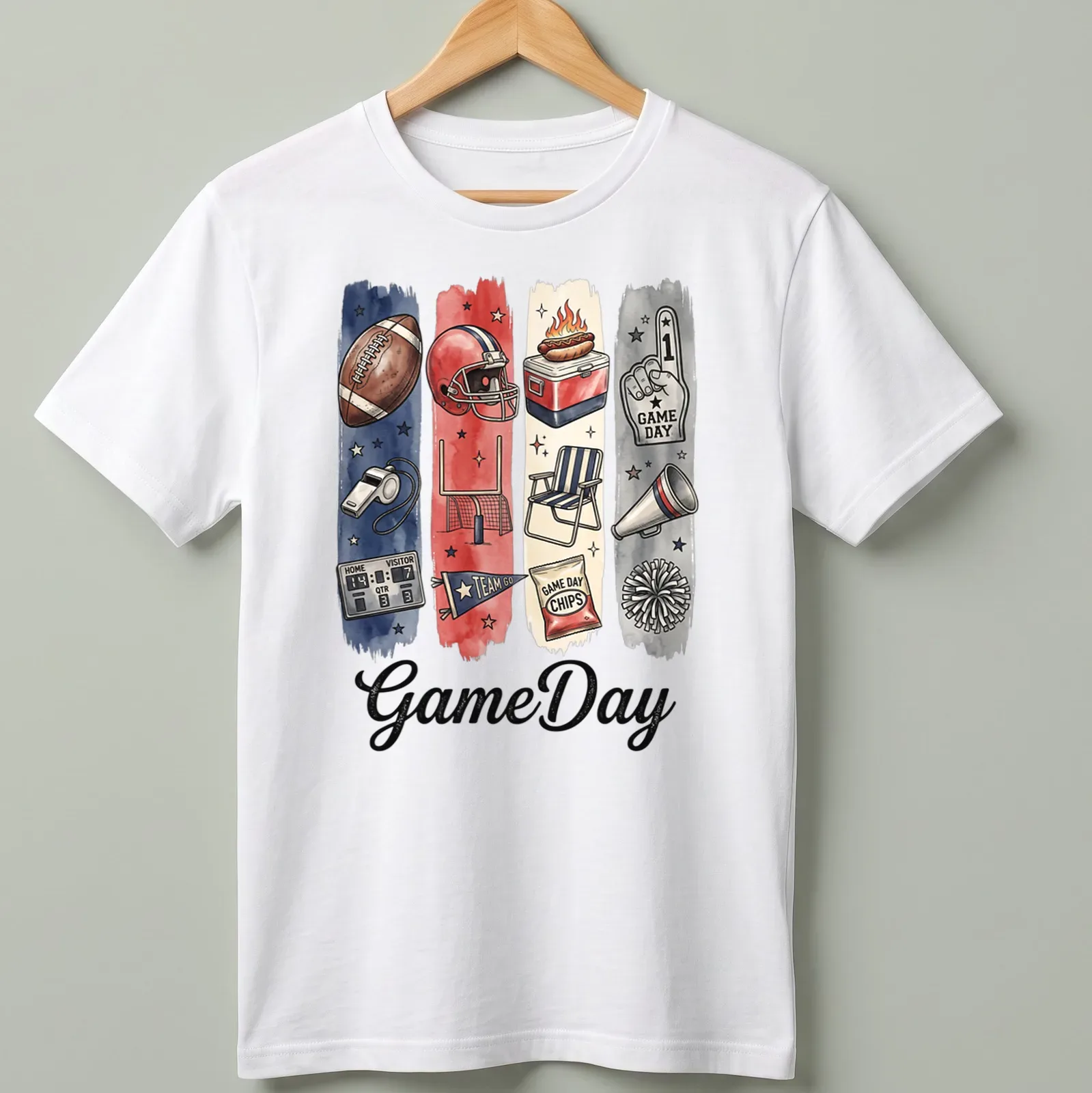 Watercolor print featuring GameDay and football elements in red, blue, cream, black, and brown — printed on a unisex t-shirt