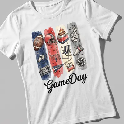 Watercolor print featuring GameDay and football elements in red, blue, cream, black, and brown — printed on a women's shirt