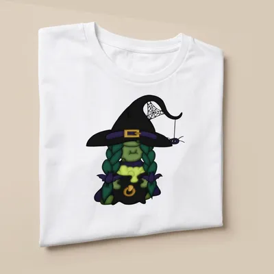 Kawaii cartoon green witch with spider in colorful Halloween design — printed on a unisex t-shirt (angled view)