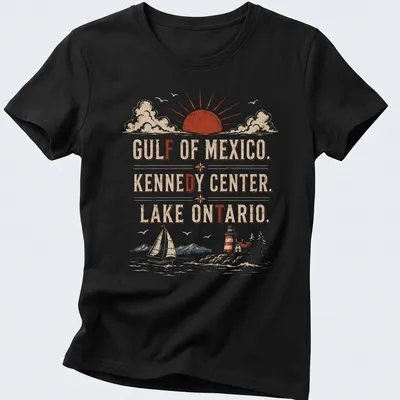 Vintage retro T-shirt with sailboat, lighthouse, and mountains at sunset — printed on a women's shirt