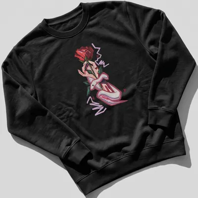 Illustrative design of a hand holding a rose and a snake, featuring bold colors. — printed on a unisex sweatshirt