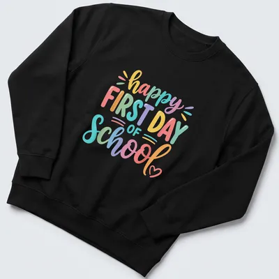 Colorful text reads happy FIRST DAY of SCHOOL on a vibrant teacher — printed on a unisex sweatshirt