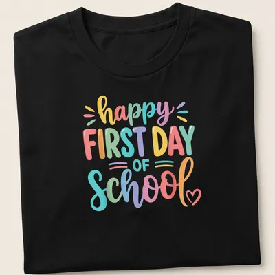 Colorful text reads happy FIRST DAY of SCHOOL on a vibrant teacher t-shirt