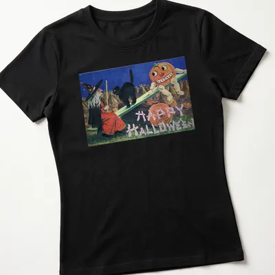 Vintage illustration of a witch, black cat, and pumpkin with Happy Halloween text — printed on a women's shirt
