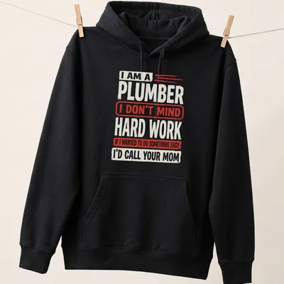 Bold vintage design featuring plumber humor in red and cream text — printed on a unisex hoodie