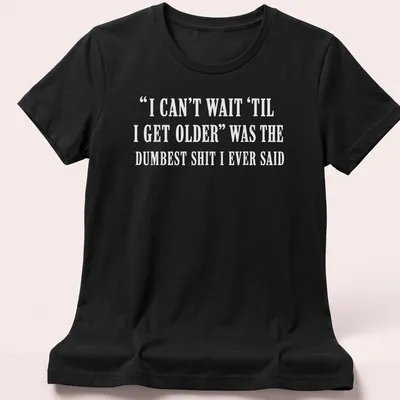 Sarcastic typography shirt about the irony of growing older. — printed on a women's shirt