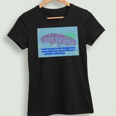 Colorful cartoon of a sentient water bear with a humorous quote about belief. — printed on a women's shirt