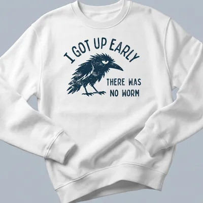 Vintage distressed t-shirt with a black bird and humorous text about early mornings. — printed on a unisex sweatshirt