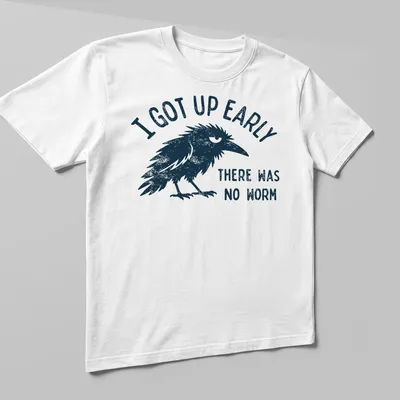 Vintage distressed t-shirt with a black bird and humorous text about early mornings. — printed on a unisex t-shirt (angled view)