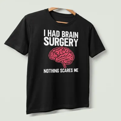 Bold typography shirt stating I Had Brain Surgery Nothing Scares Me with a brain graphic — printed on a unisex t-shirt (angled view)