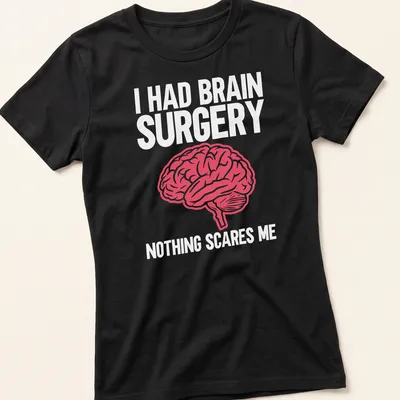 Bold typography shirt stating I Had Brain Surgery Nothing Scares Me with a brain graphic — printed on a women's shirt