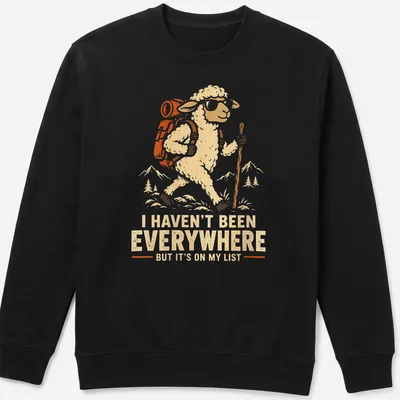 Vintage-style t-shirt with hiking sheep and travel-themed text — printed on a unisex sweatshirt