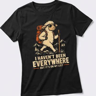 Vintage-style t-shirt with hiking sheep and travel-themed text — printed on a women's shirt