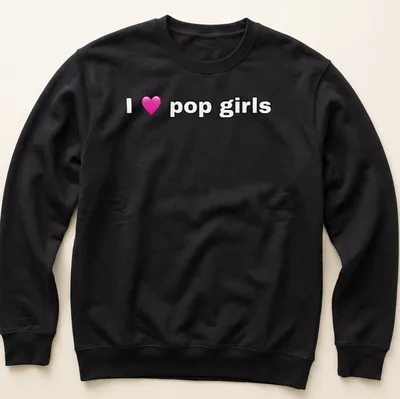 Playful typography t-shirt featuring the text I love pop girls with a heart symbol — printed on a unisex sweatshirt